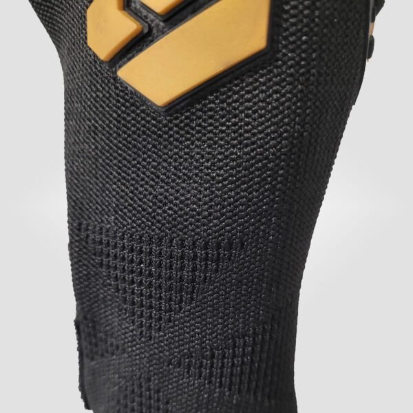 image of Constructed from a durable, lightweight fabric, the gloves provide maximum flexibility while maintaining superior breathability, ensuring necessary agility without sacrificing strength. This fabric’s design ensures a snug fit, promoting natural movement and optimal comfort throughout the game. Hexagon's streamlined design makes them ideal for keepers who desire style and exceptional function.